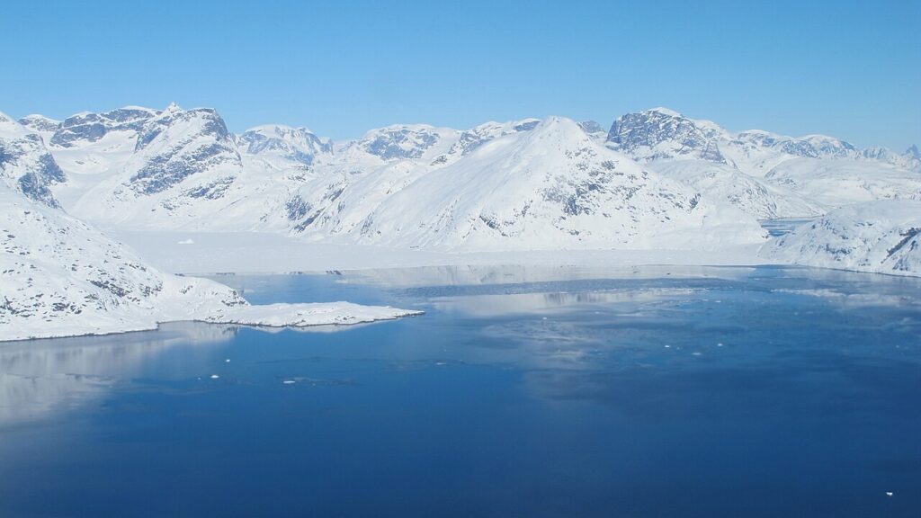 A fjord in southeast Greenland, photographed during a NASA IceBridge glacier survey. Photo: NASA / Jim Yungel, via Wikimedia Commons.